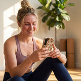 Seashell Petal Burst Samsung Galaxy S25 Case - Lifestyle photo showing phone case in use