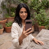 Chocolate Brown Leaf Veins Google Pixel 10/10 Pro Case - Lifestyle photo showing phone case in use