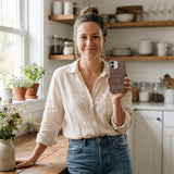 Chocolate Brown Desert Run iPhone 17 Pro Case - Lifestyle photo showing phone case in use