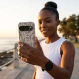 London Fog Indigo Bouquet Google Pixel 10/10 Pro Case - Lifestyle photo showing phone case in use