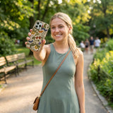 Seashell Fall Berries iPhone 17 Case - Lifestyle photo showing phone case in use