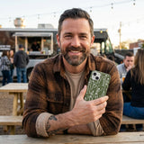 Forest Floor Boogie Bones iPhone 14 Case - Lifestyle photo showing phone case in use