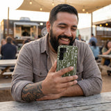 Forest Floor Boogie Bones Samsung Galaxy S25 Case - Lifestyle photo showing phone case in use