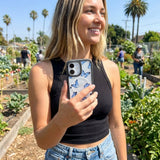 Clear Blue Butterflies iPhone 17 Case With Noir Ridge (MagSafe included) - Lifestyle photo showing phone case in use