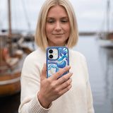 Clear Blue Chrome iPhone 17 Case With True Blue Ridge (MagSafe included) - Lifestyle photo showing phone case in use