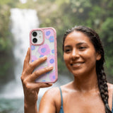 Clear Blush Bloom iPhone 17 Pro Case With Petal Pink Ridge (MagSafe included) - Lifestyle photo showing phone case in use