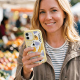 Clear Doodles iPhone 17 Case With Sunbeam Ridge (MagSafe included) - Lifestyle photo showing phone case in use