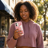 Clear Dicey Cherries iPhone 17 Case With Petal Pink Ridge (MagSafe included) - Lifestyle photo showing phone case in use