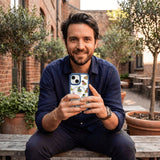 Clear Fancy Frogs iPhone 17 Case With True Blue Ridge (MagSafe included) - Lifestyle photo showing phone case in use