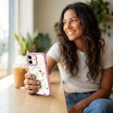 Clear Swan Garden iPhone 17 Case With Petal Pink Ridge (MagSafe included) - Lifestyle photo showing phone case in use