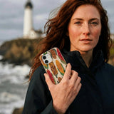 Seashell Cornfield iPhone 14 Case - Lifestyle photo showing phone case in use