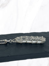 Caged Quartz Spike Pendant