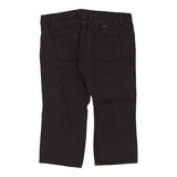 Vintage black Oakley Jeans - mens 32" waist