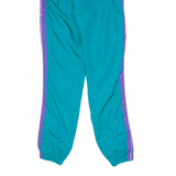 ELLESSE Womens Track Pants Blue Nylon Tapered UK 10 W26 L30