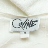 COLINE Womens Top White V-Neck Floral M