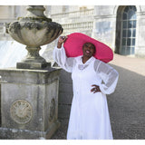 Women's Plus Size Aphrodite White Holiday Resort Dress with hoodie and white undergarment shown as a close up, paired with a pink sunhat.