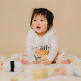 cute girl in the wee bean toddler pajamas in dim sum