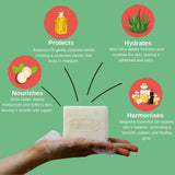 Aloe Vera Soap bar with benefits listed on a green background