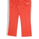 NIKE Womens Joggers Red White Logo M W31 L25 Slim Tapered Cotton Blend