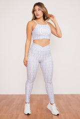 Aquarius Crisscross Four-Way Top