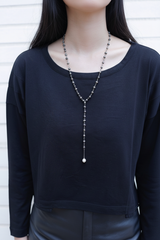 Model wearing Black Pearl Lariat Chain