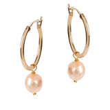 The perfect everyday gold hoop earrings entirely handmade with sustainable materials