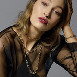 The Lilly Twisted Cable Link Gold Chain Necklace is handmade of brass (one the most recycled metals in the world) and 14 Carat Fair Trade gold.