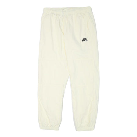 NIKE Mens Joggers Cream L W30 L28 Slim Tapered Fit SB Logo Elastic Waist