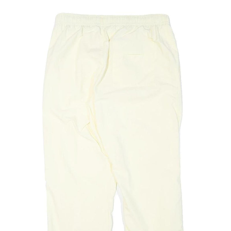 NIKE Mens Joggers Cream L W30 L28 Slim Tapered Fit SB Logo Elastic Waist