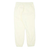 NIKE Mens Joggers Cream L W30 L28 Slim Tapered Fit SB Logo Elastic Waist