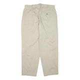 DOCKERS Mens Relaxed Beige Cotton Blend Trousers W32 L27 Zip Closure Casual