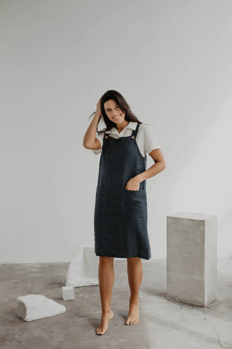 Women Wearing A Black Linen Apron Dress In A Art Gallery