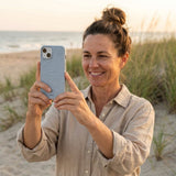 Powder Blue Ebb and Flow iPhone 14 Case - Lifestyle photo showing phone case in use