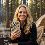 London Fog Into the woods iPhone 14 Case - Lifestyle photo showing phone case in use