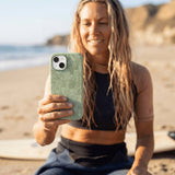 Sage Green Green Oasis iPhone 15 Pro Case - Lifestyle photo showing phone case in use