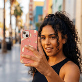 Bubblegum Pink Purrfection iPhone 15 Case - Lifestyle photo showing phone case in use