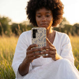 London Fog Indigo Bouquet Samsung Galaxy S25 Case - Lifestyle photo showing phone case in use