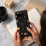 Black Galactic Glow Google Pixel 8 Case - Lifestyle photo showing phone case in use