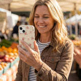 Seashell Roses and Bows iPhone 14 Case - Lifestyle photo showing phone case in use