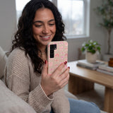 Seashell Rosy Bows Samsung Galaxy S25 Case - Lifestyle photo showing phone case in use