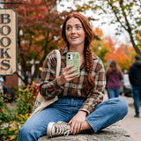 Sage Green Knit Nook iPhone 15 Pro Case - Lifestyle photo showing phone case in use