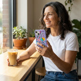 Lavender Retro Grid iPhone 14 Case - Lifestyle photo showing phone case in use