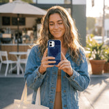 Powder Blue Denim Heart iPhone 15 Pro Case - Lifestyle photo showing phone case in use
