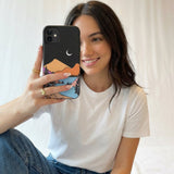 Black Night Trails iPhone 11 Case - Lifestyle photo showing phone case in use