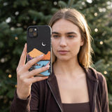 Black Night Trails iPhone 13 Case - Lifestyle photo showing phone case in use