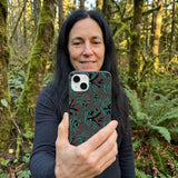 Black Fossilized iPhone 14 Case - Lifestyle photo showing phone case in use