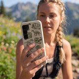 London Fog Jurassic Samsung Galaxy S25 Case - Lifestyle photo showing phone case in use