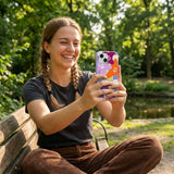 Lavender Bright Blooms iPhone 14 Case - Lifestyle photo showing phone case in use