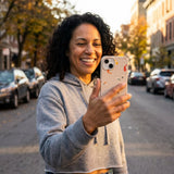Seashell Lil Koi iPhone 14 Case - Lifestyle photo showing phone case in use