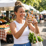Honey Flower Tiles iPhone 14 Case - Lifestyle photo showing phone case in use